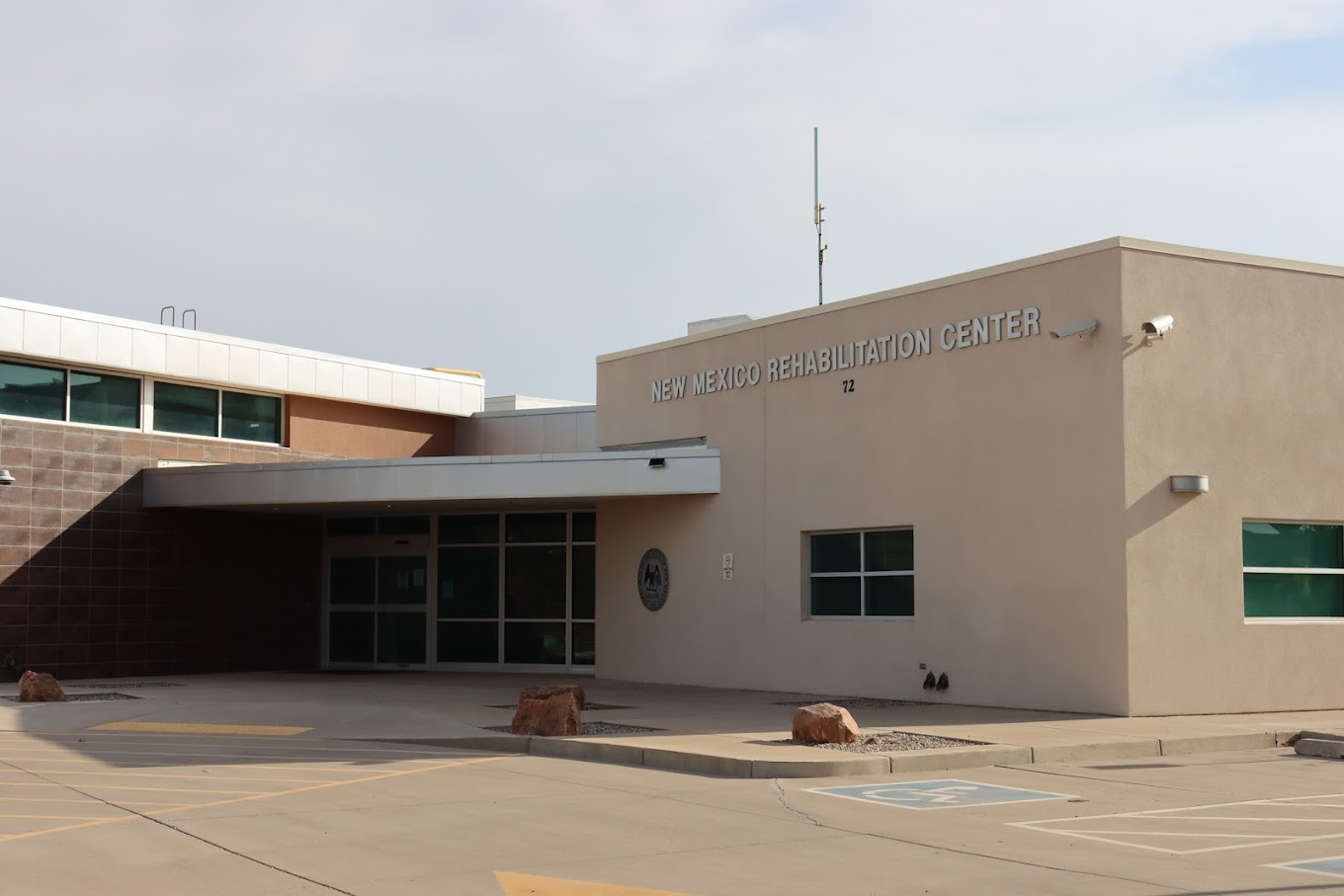 Main doors and sign of New Mexico Rehabilitation Center