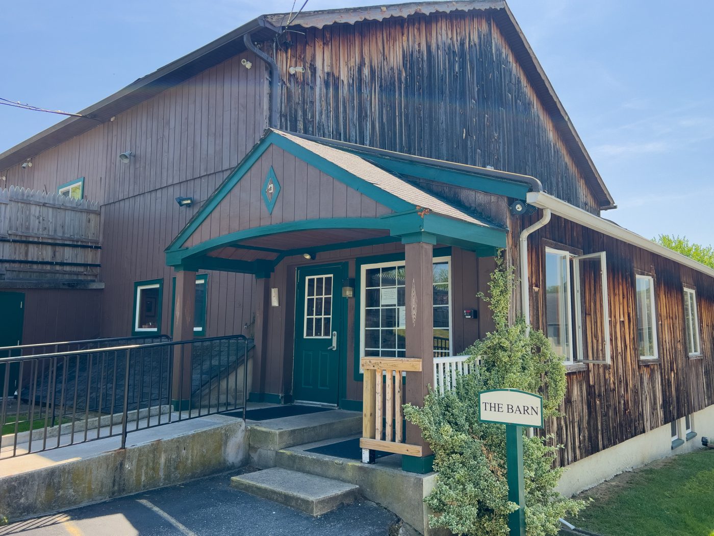 Rustic barn-style building used for meetings and activities at treatment facility
