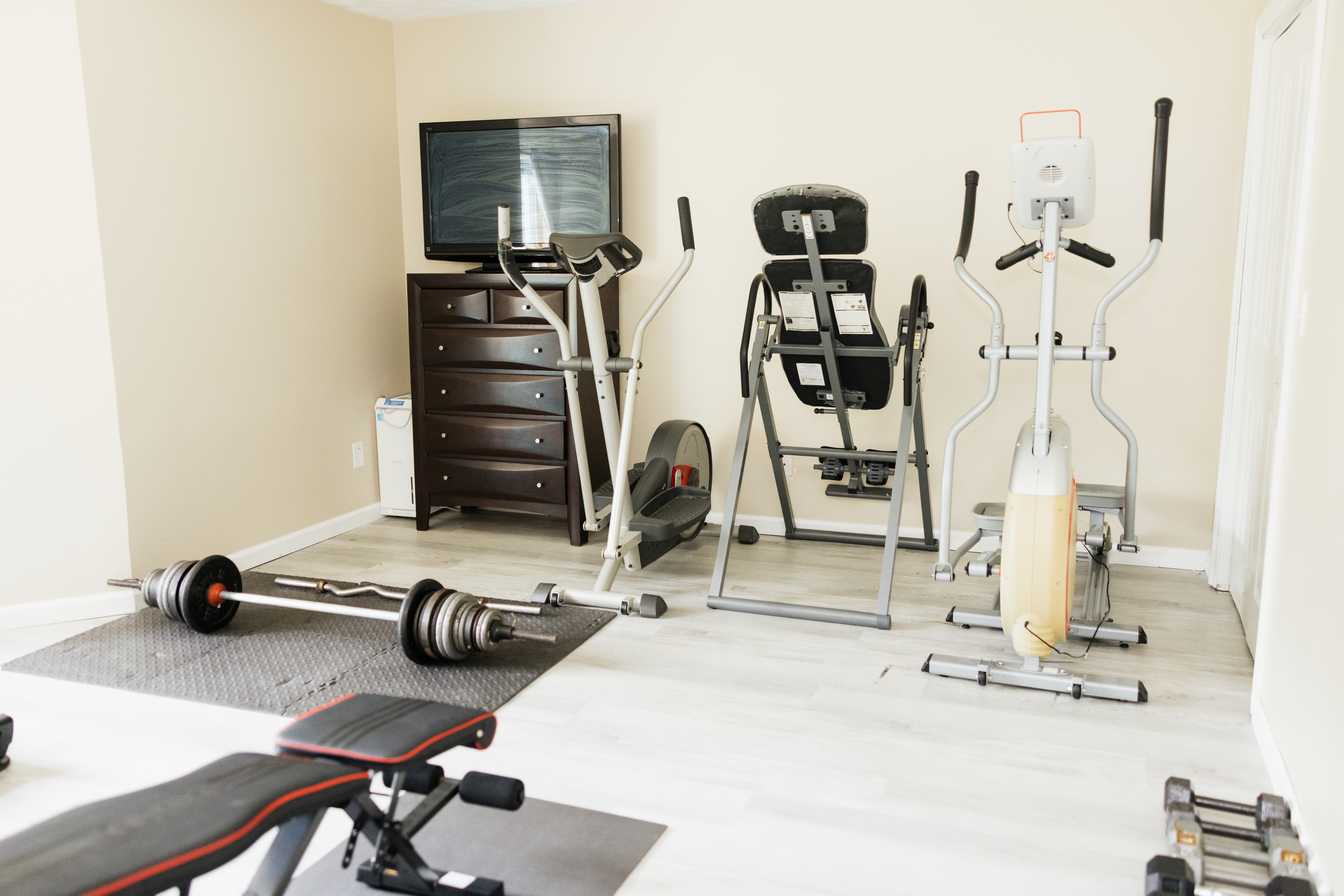 Gym equipment and weights in fitness room