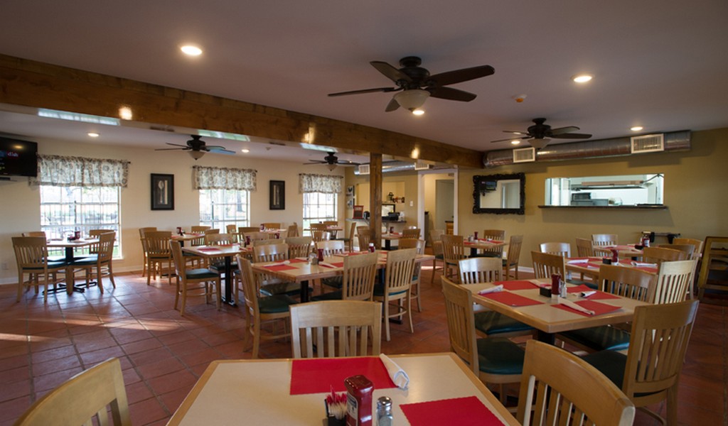 Dning area with tables and chairs.