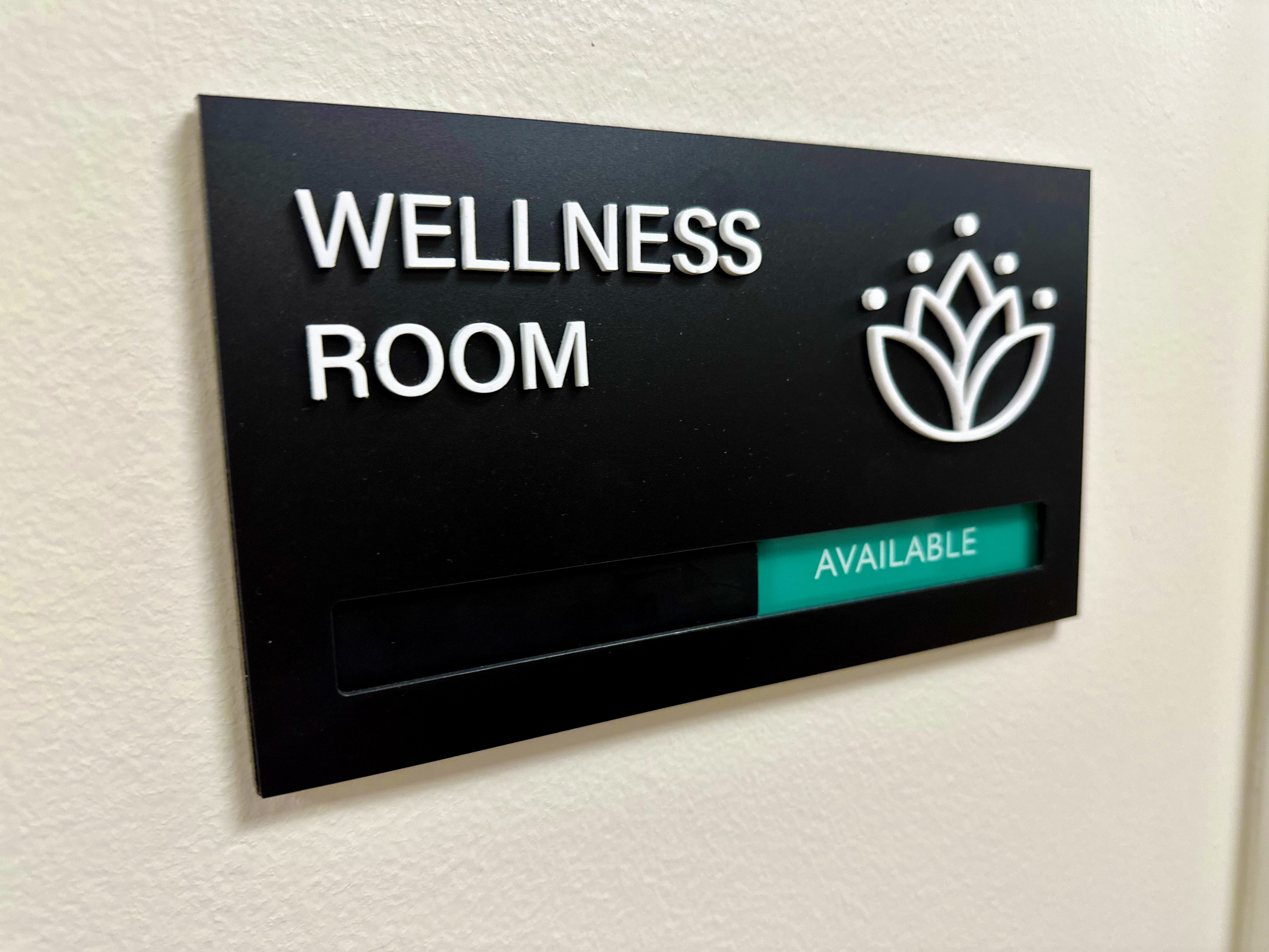 Wellness room sign with availability indicator