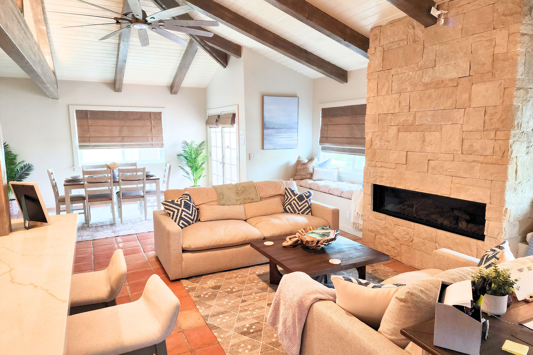 Open layout with dining set and lounge seating