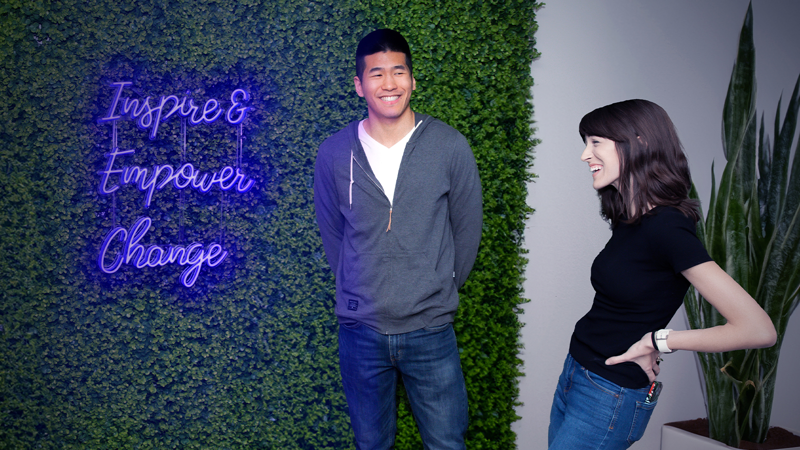 Lobby in facility with decorated walls.