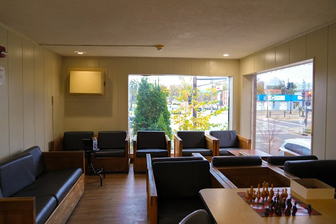 Waiting room with couches and large windows