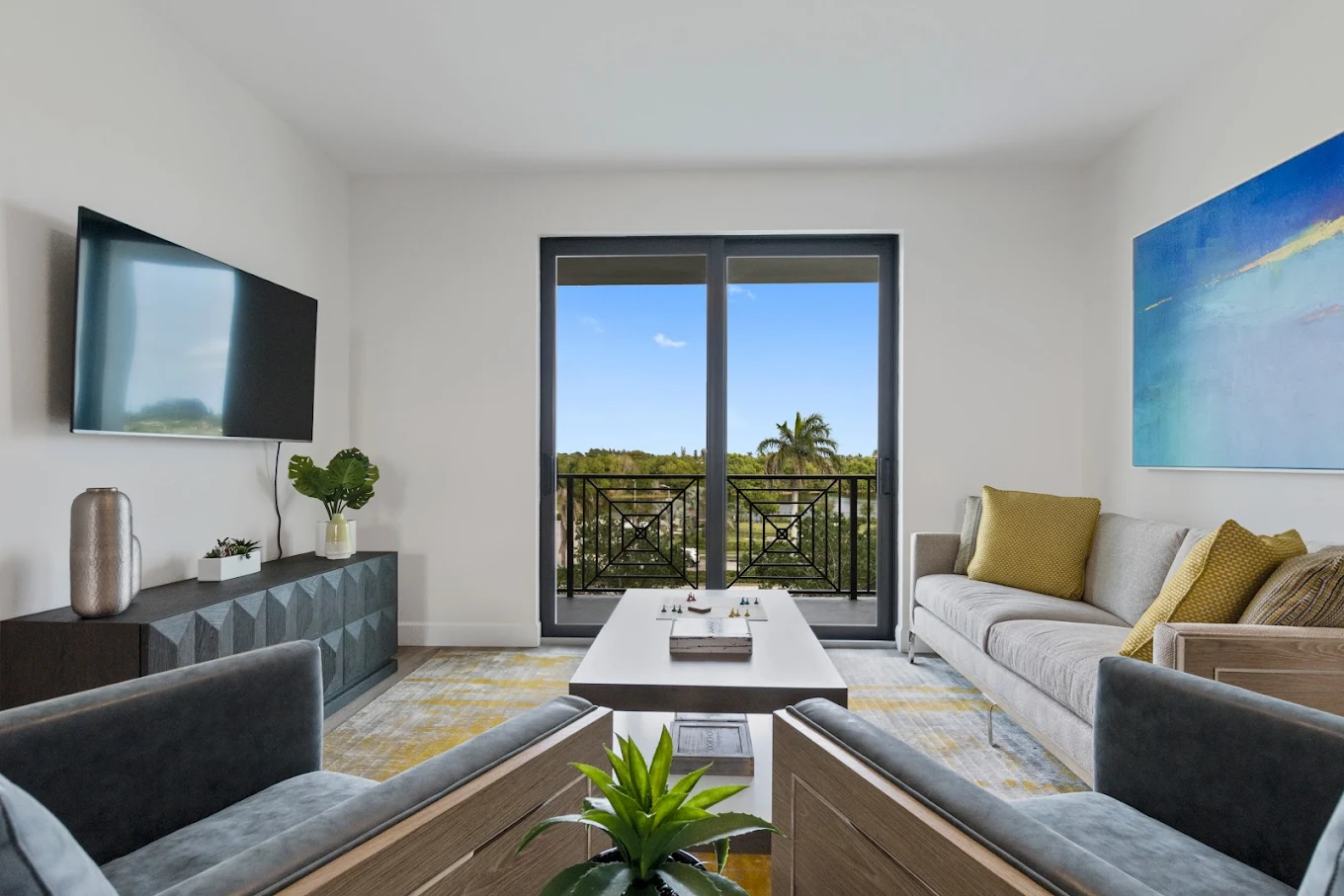 TV lounge with balcony view and seating