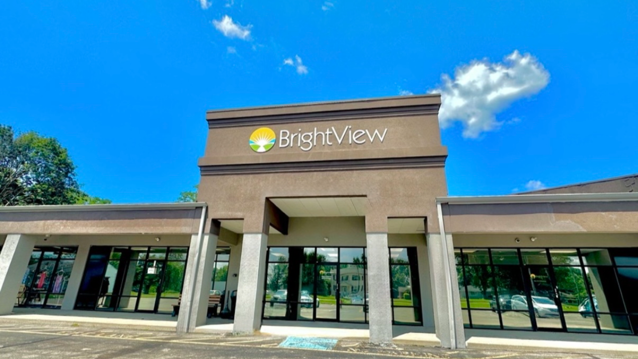 Exterior of BrightView Health Middletown with a brown storefront, BrightView sign, covered entrance, large windows, and accessible parking
