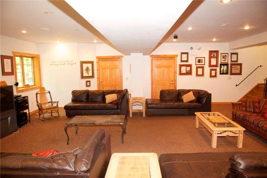 A warm and inviting shared lounge with leather sofas