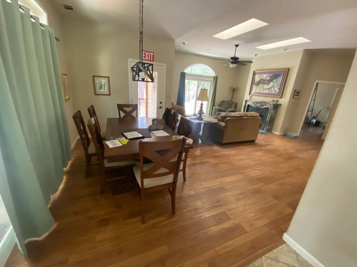Dining table and cozy living room with natural light