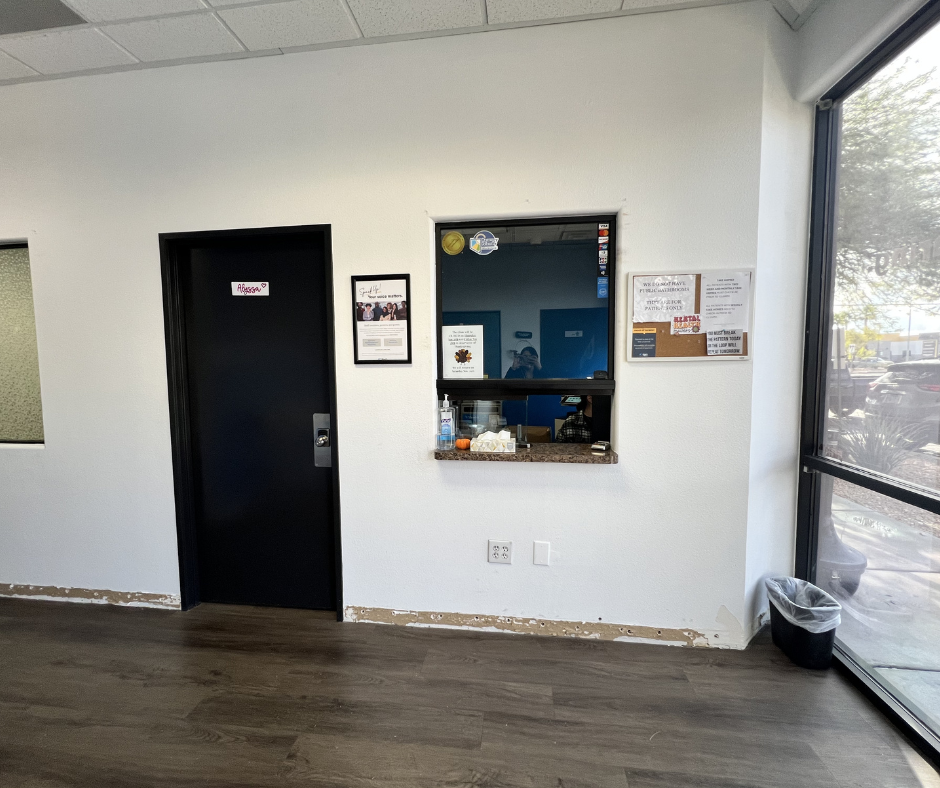 Reception window beside lobby entrance