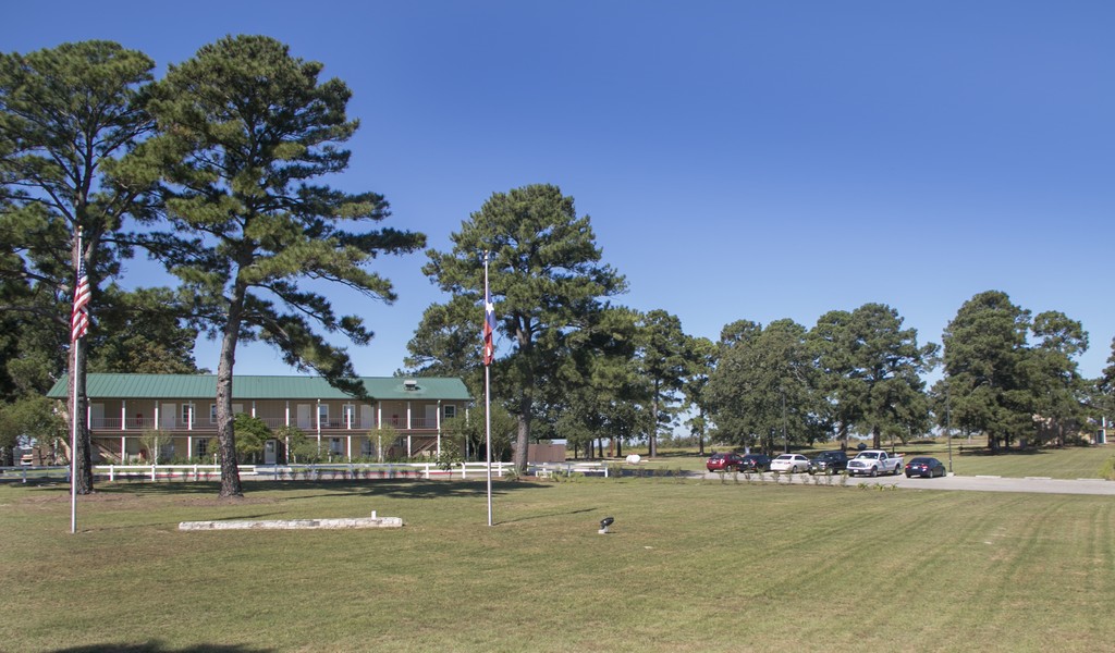 Facility exterior lawn with flags.