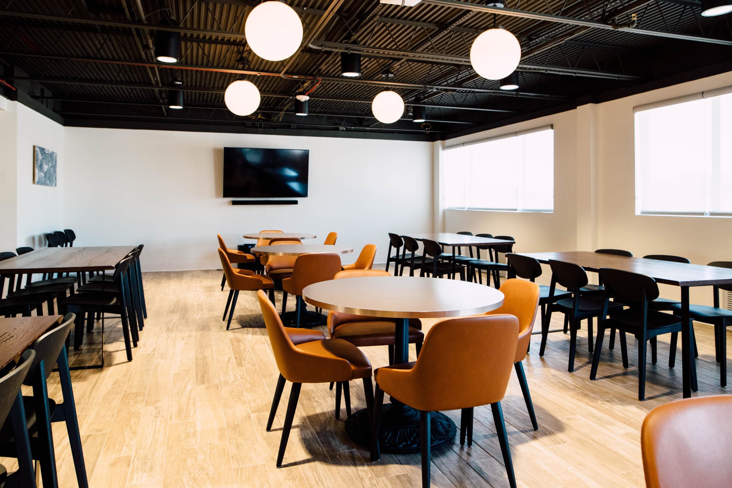 Modern dining room with round and rectangular tables