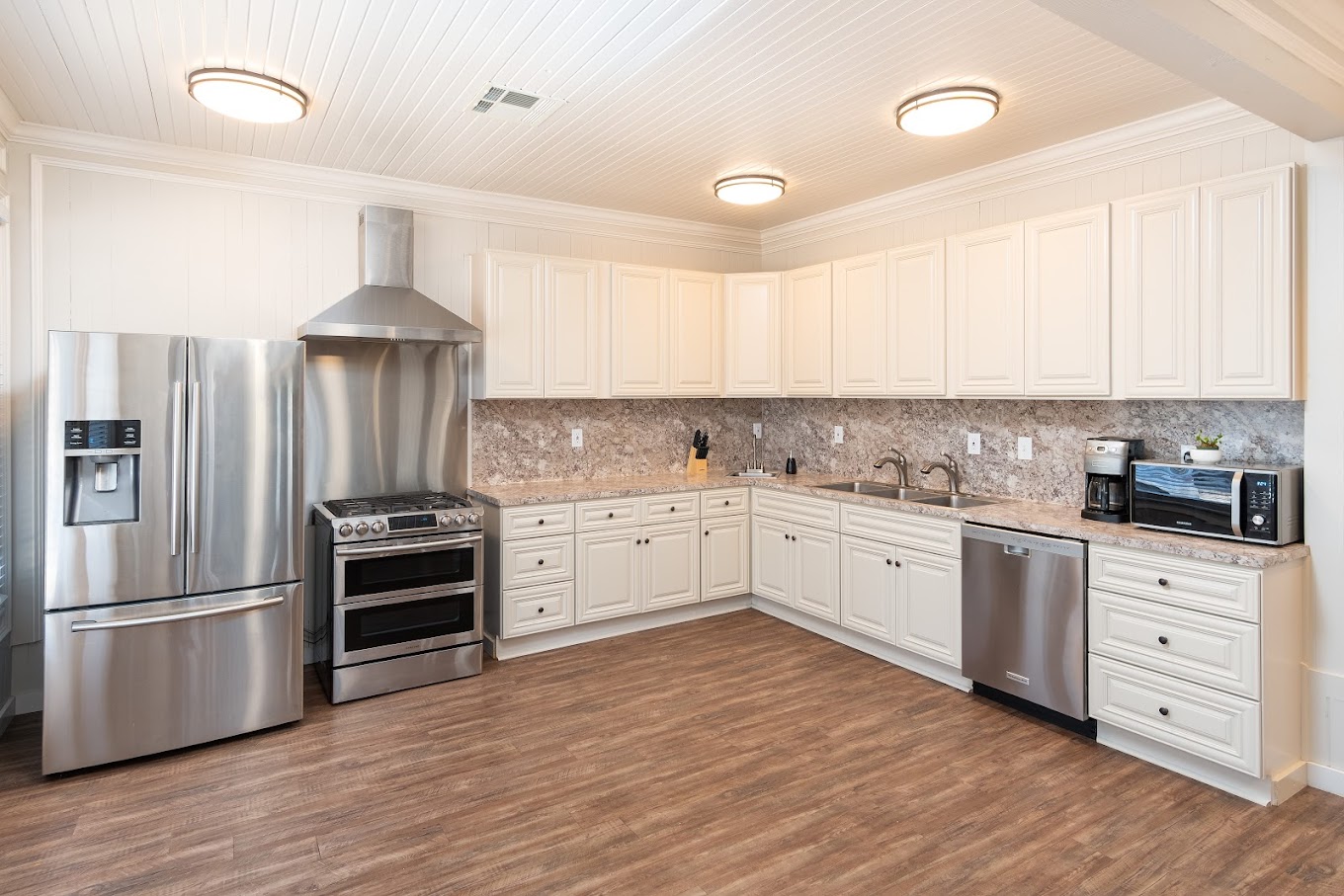 Kitchen with equipment, and a countertop.