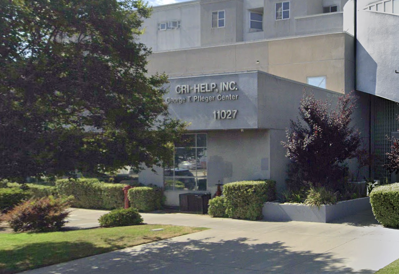 Side view of CRI-Help George T. Pfleger Center with landscaping