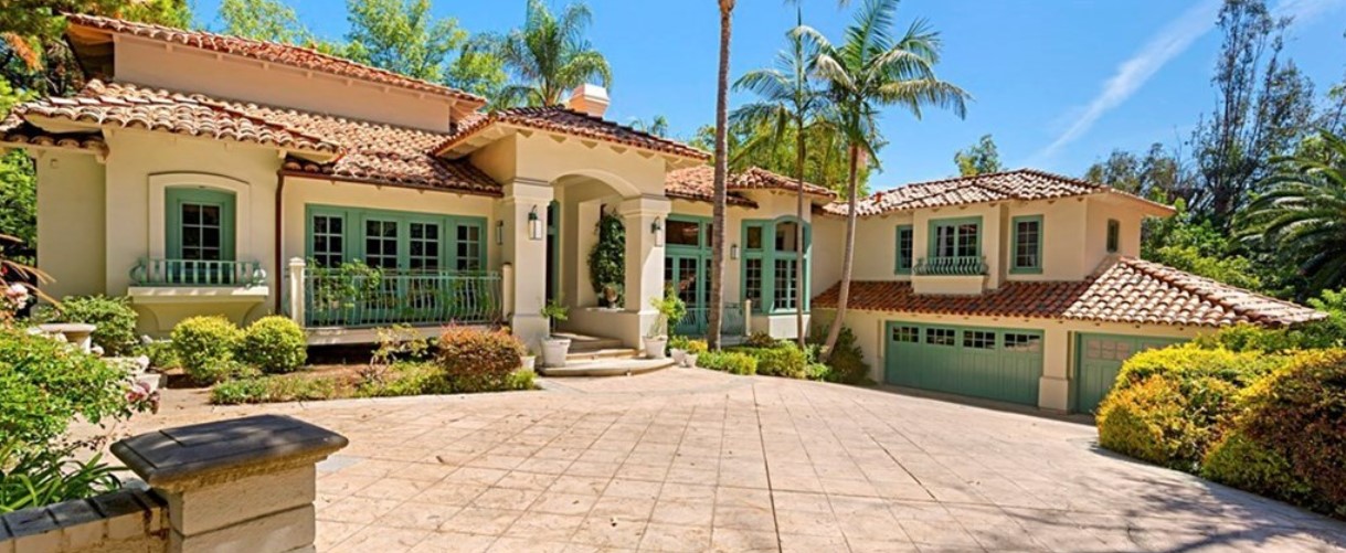 Facility exterior with entrance and parking.