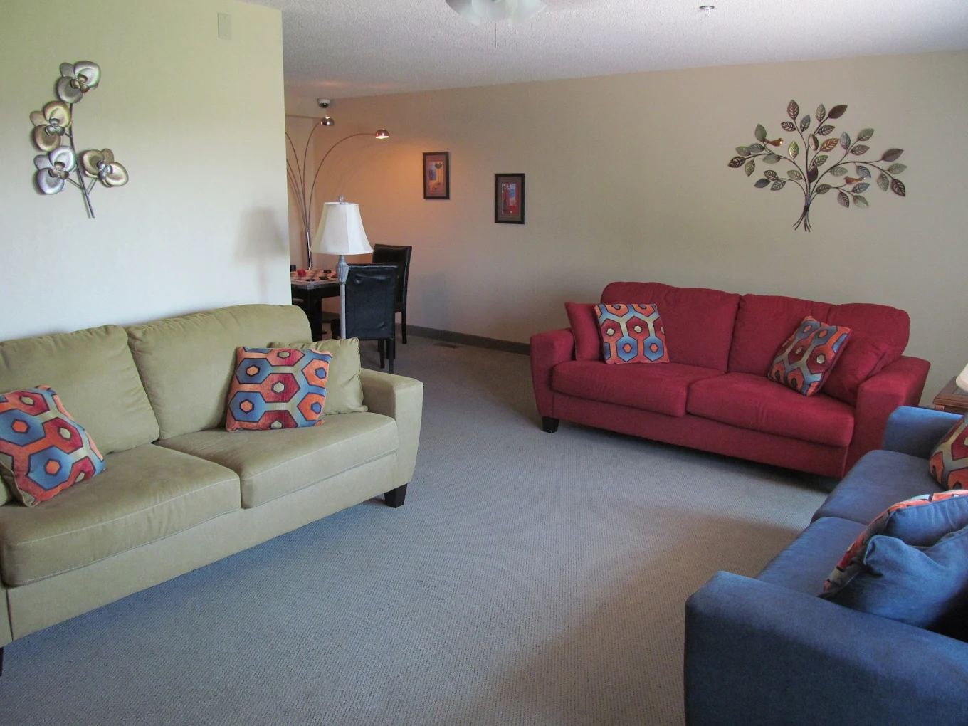 Comfortable living room with couches and shared seating