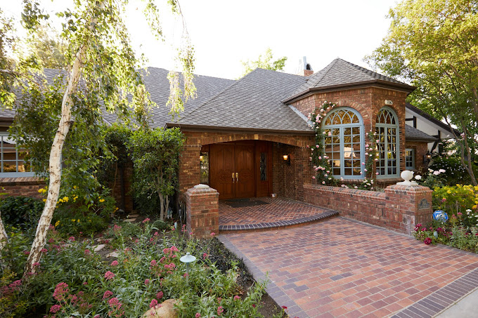 Facility entrance with paved walkway.