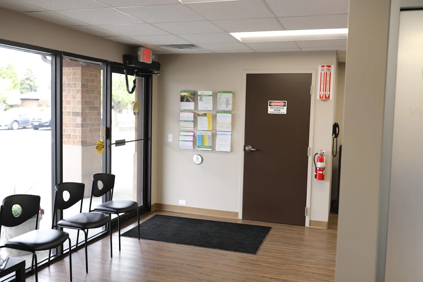 Lobby entrance with chairs and patient information