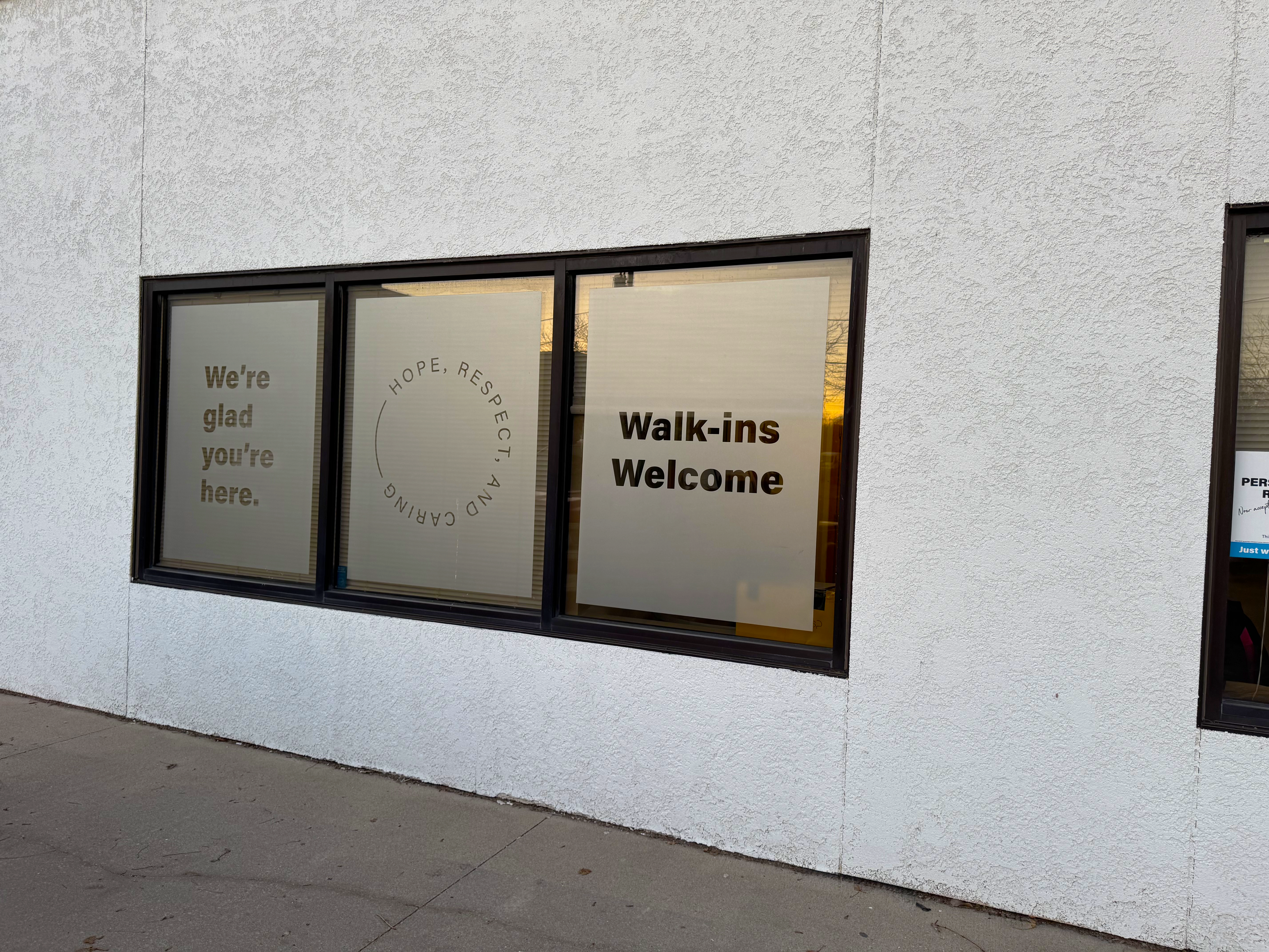 Front windows with welcome messages at BHG Des Moines Treatment Center