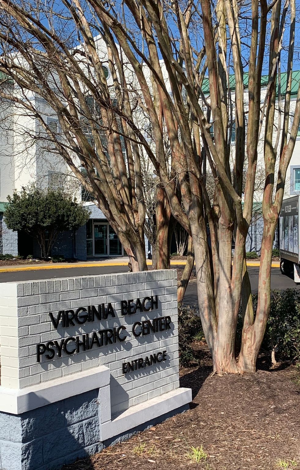 Entrance sign and trees at Virginia Beach Psychiatric Center