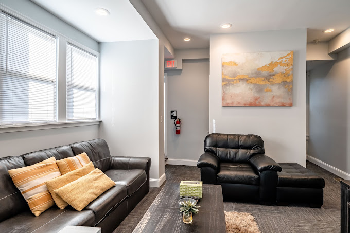Lounge area with couches and a table.