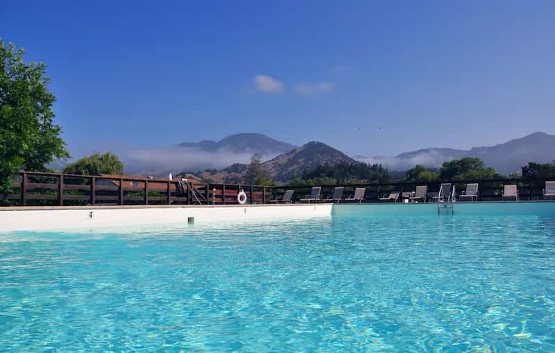 Outdoor swimming pool with mountain views
