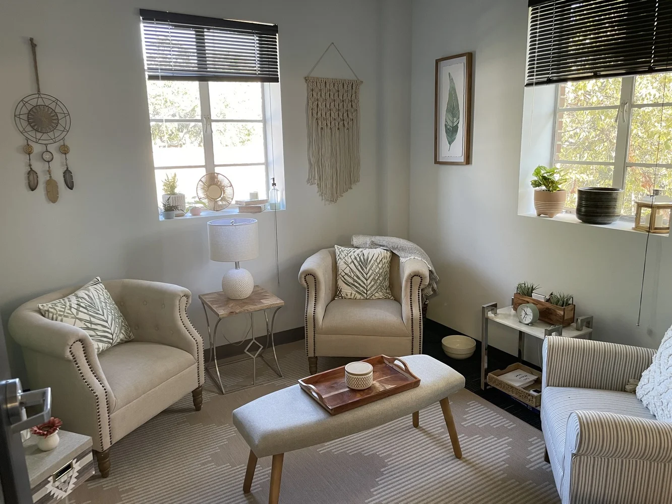 Couch lounge with artwork and natural light