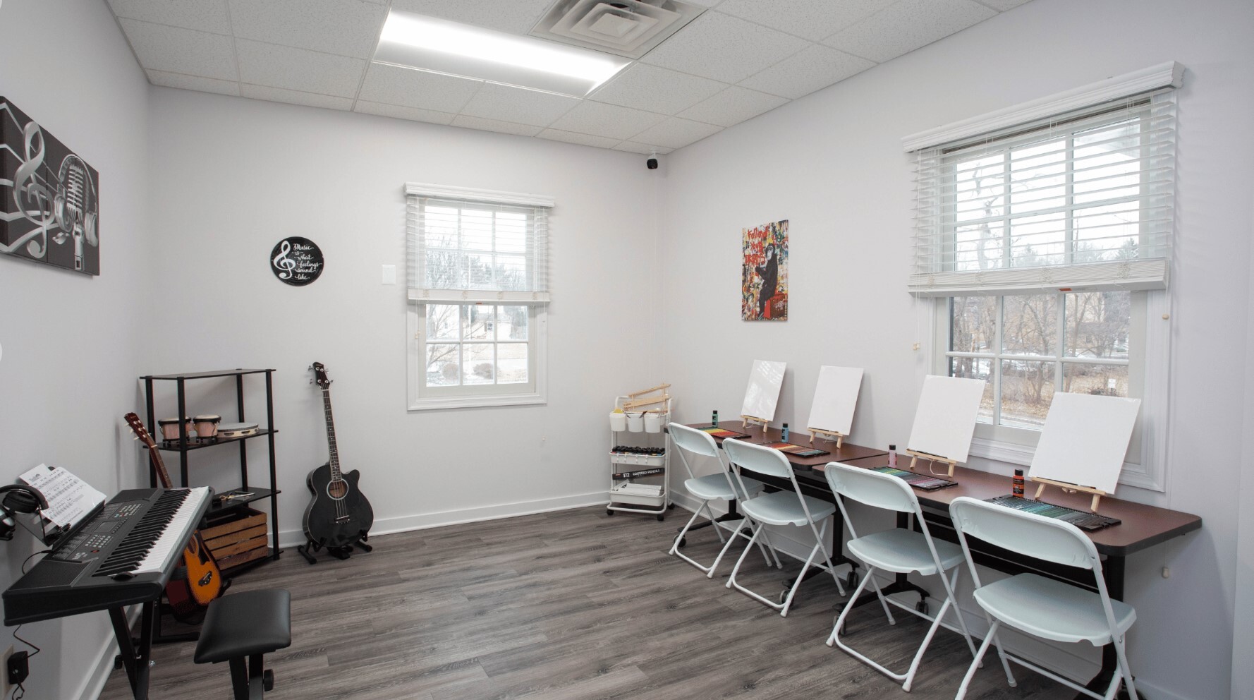 Recreational room with art supplies and instruments.