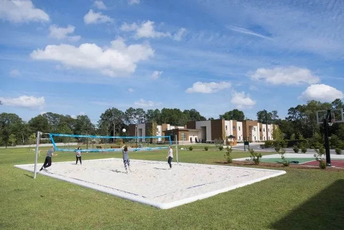 Sand volleyball court on the treatment center campus