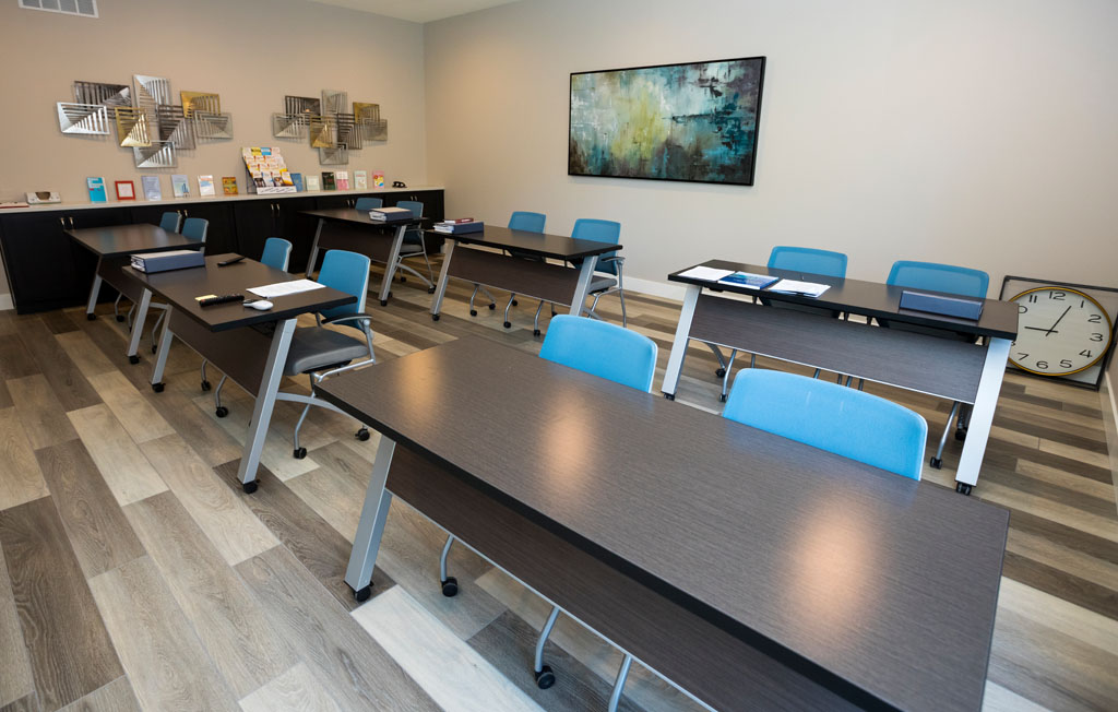 Classroom with desks set up for group therapy sessions