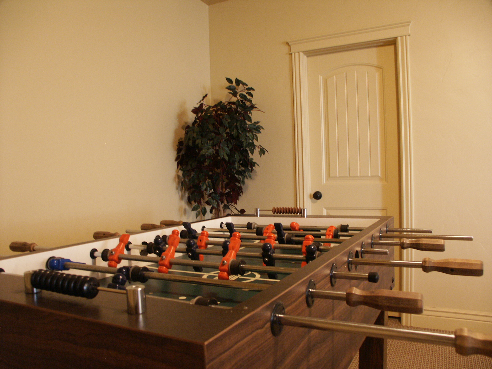 Game room with foosball table for resident recreation