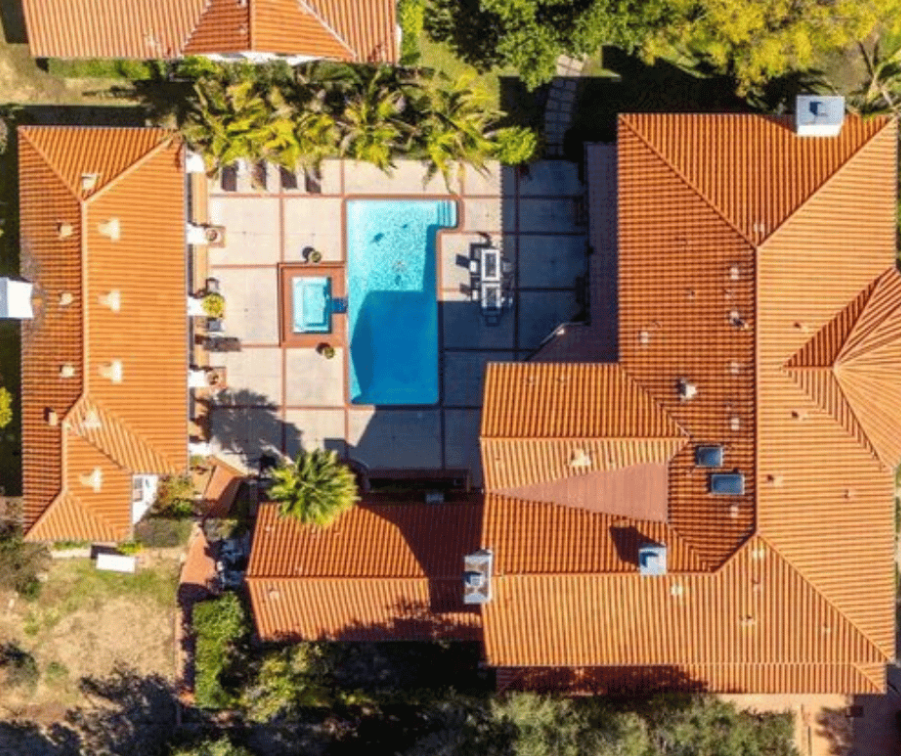 Aerial view showing pool and spa at the facility