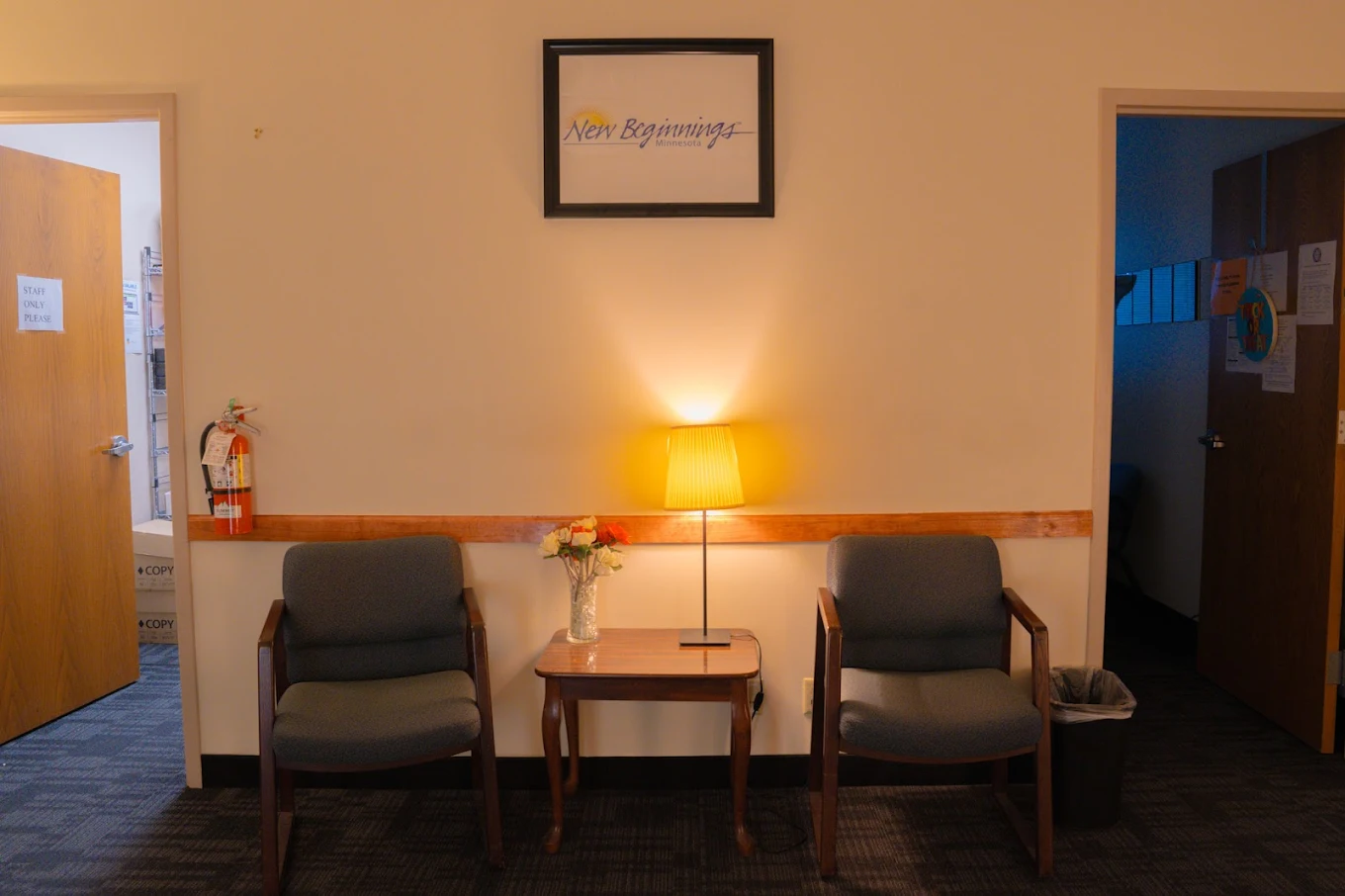 Two chairs and table in outpatient waiting area