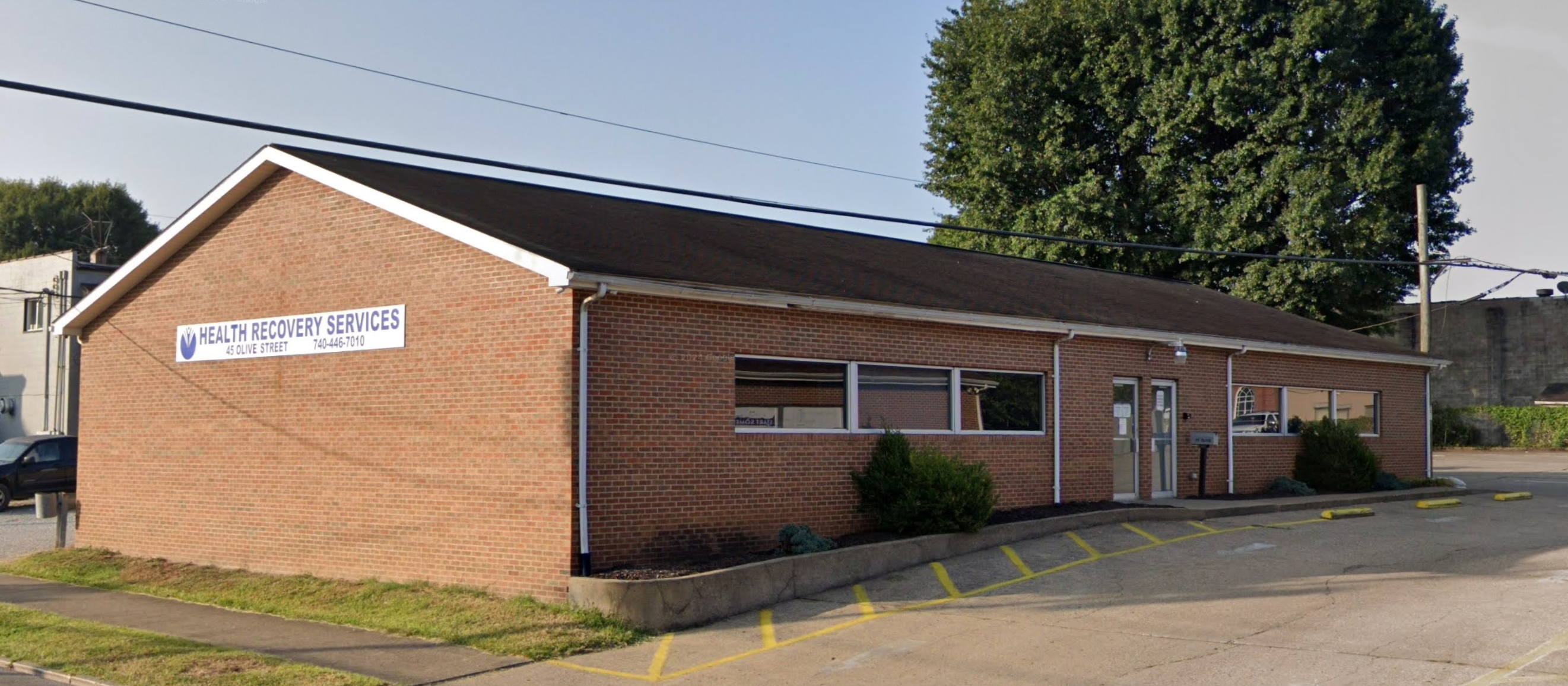 Entrance and parking for Health Recovery Services outpatient facility in Gallipolis, Ohio.