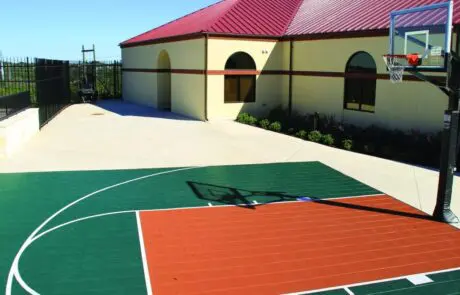 Outdoor basketball court at Laurel Ridge Treatment Center campus