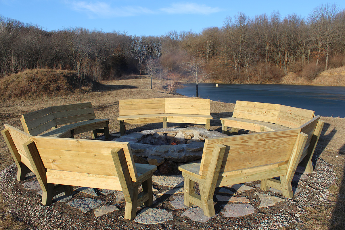 Outdoor fire pit seating area on the ranch property