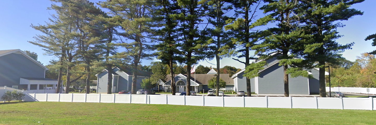Rehab facility with multiple buildings and parking area