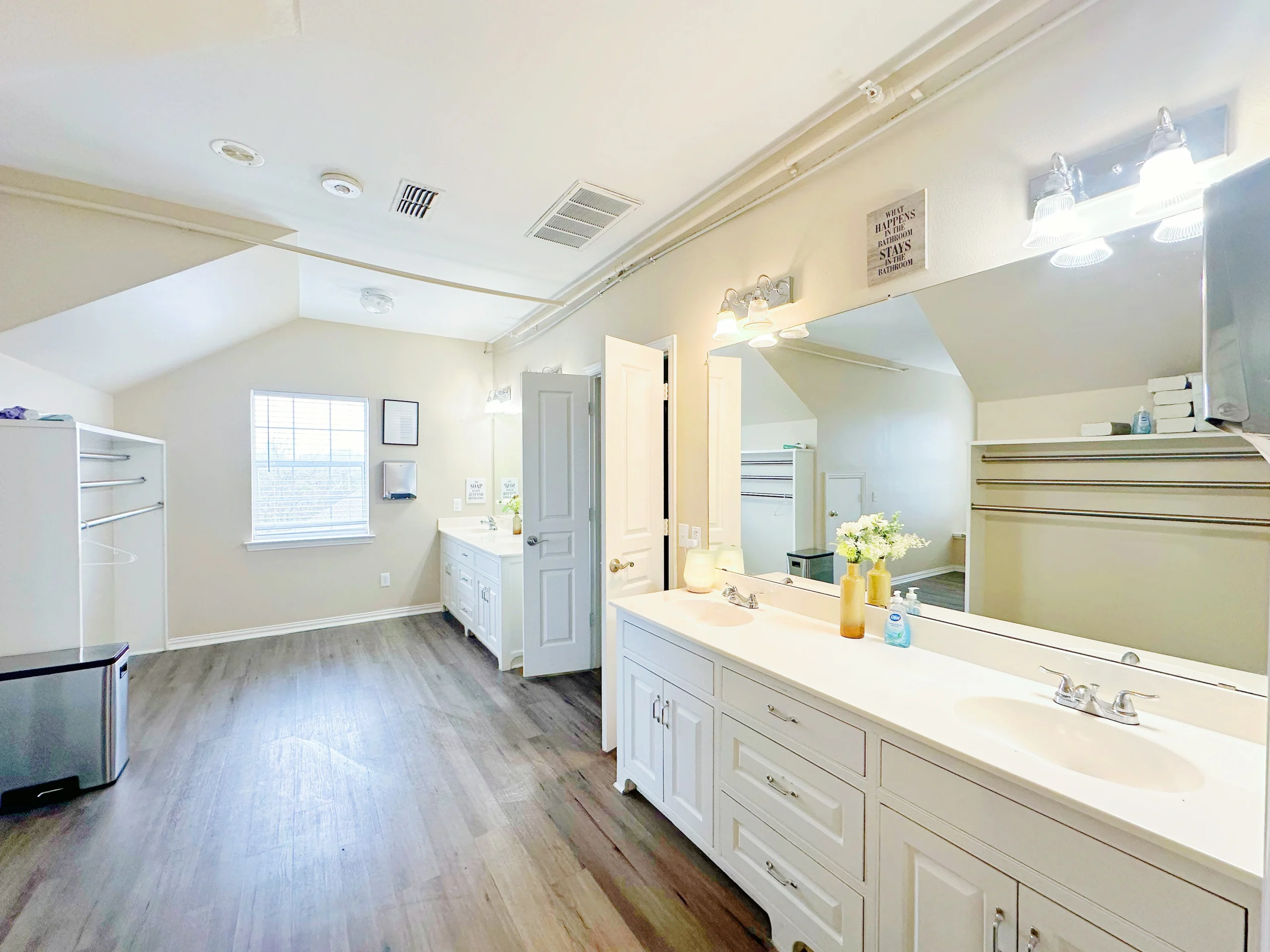 Dual-sink vanity in bright, spacious rehab bathroom