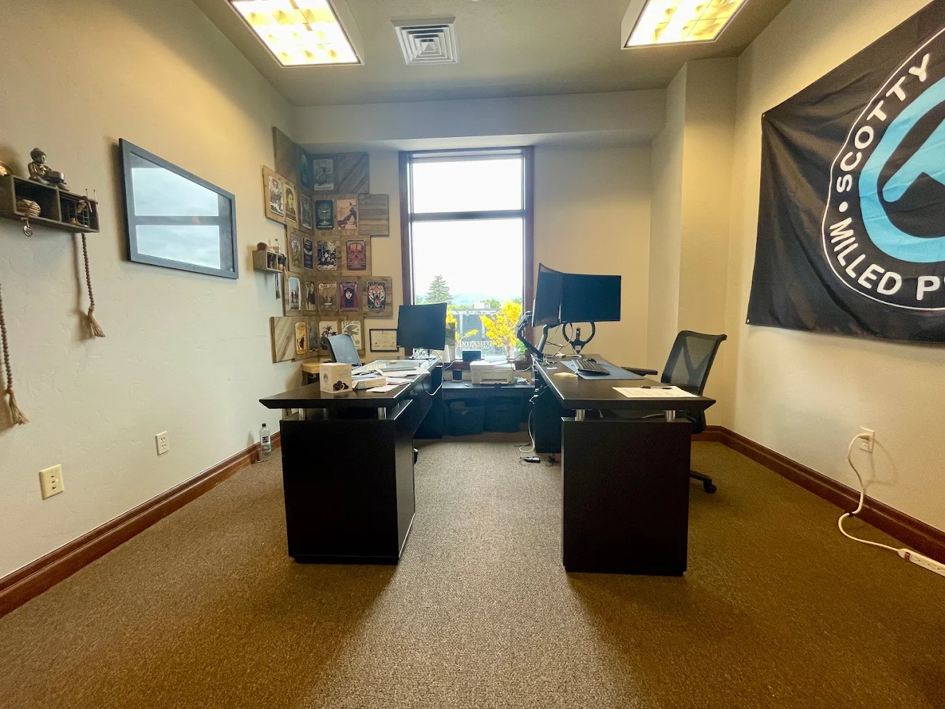 Counseling office with two desks and window view