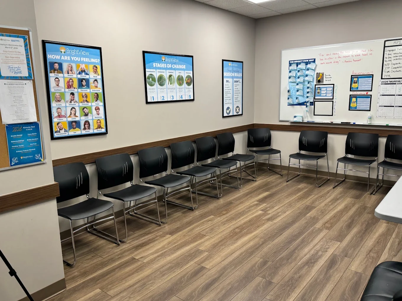 BrightView Glasgow waiting area with rows of black chairs and educational posters