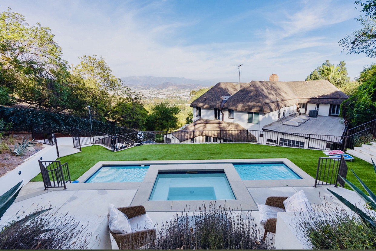 Facility backyard pool and spa.