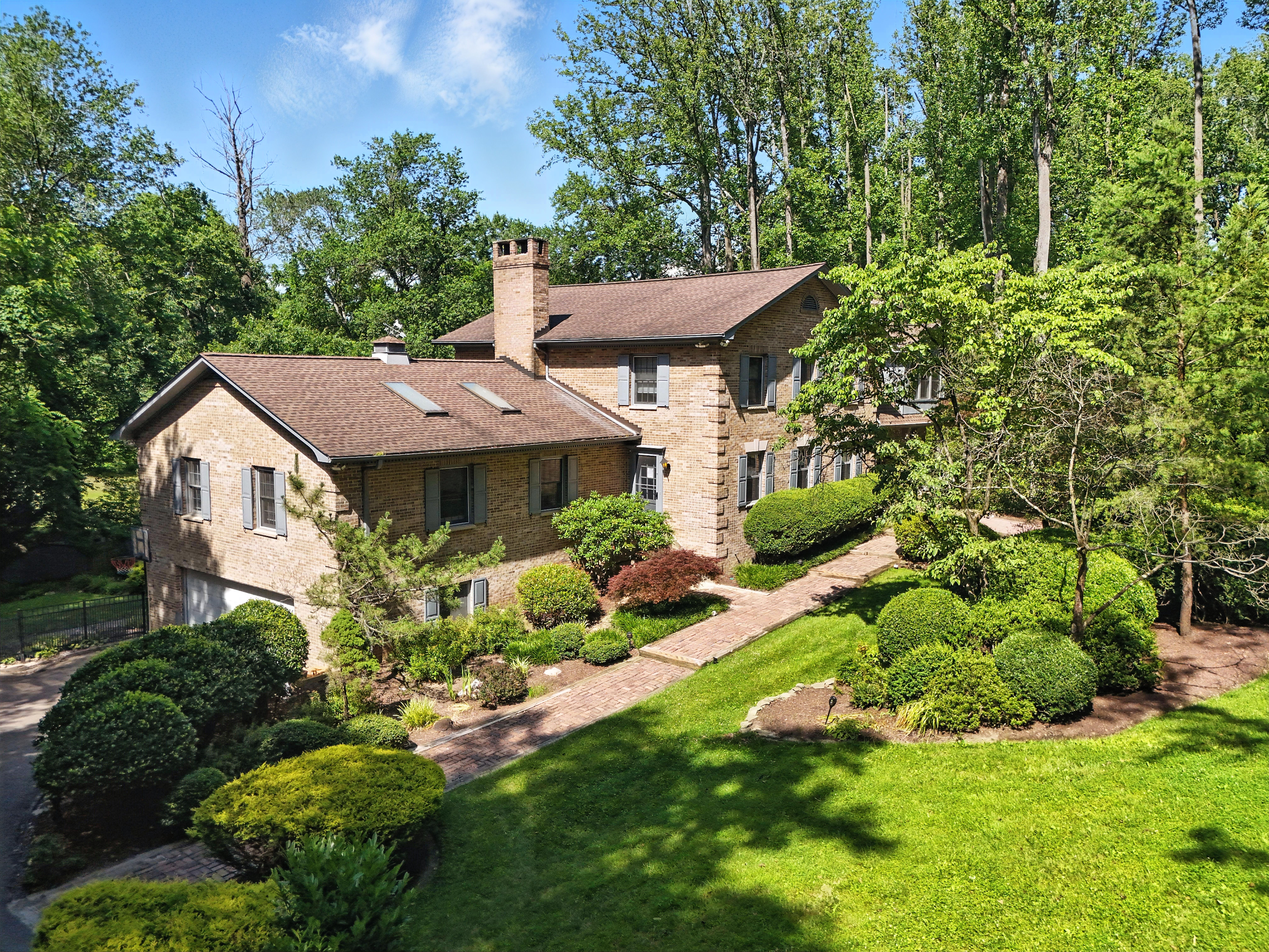 Brick building with landscaped front yard and walkway