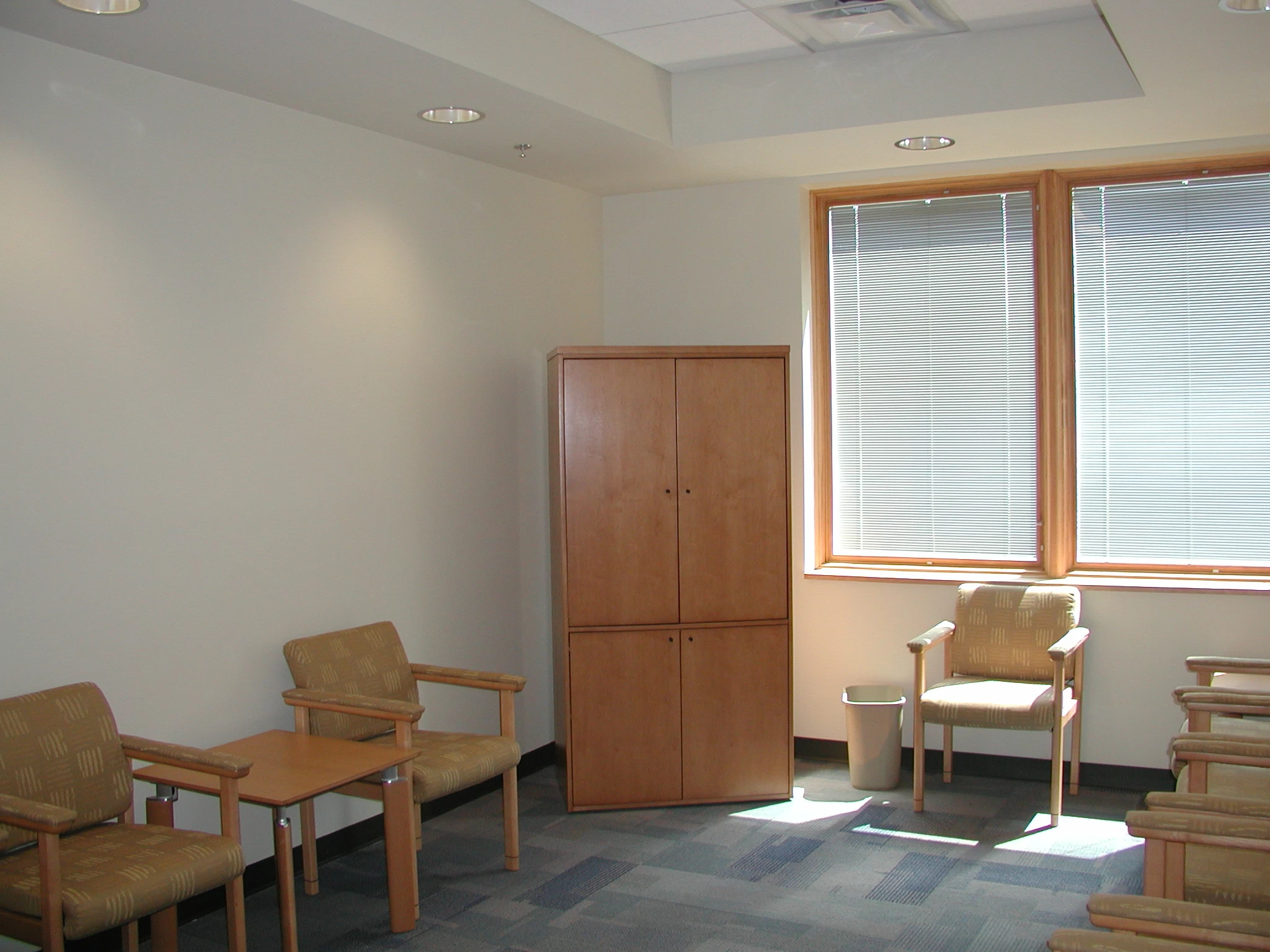 Room with armchairs and cabinet for private sessions