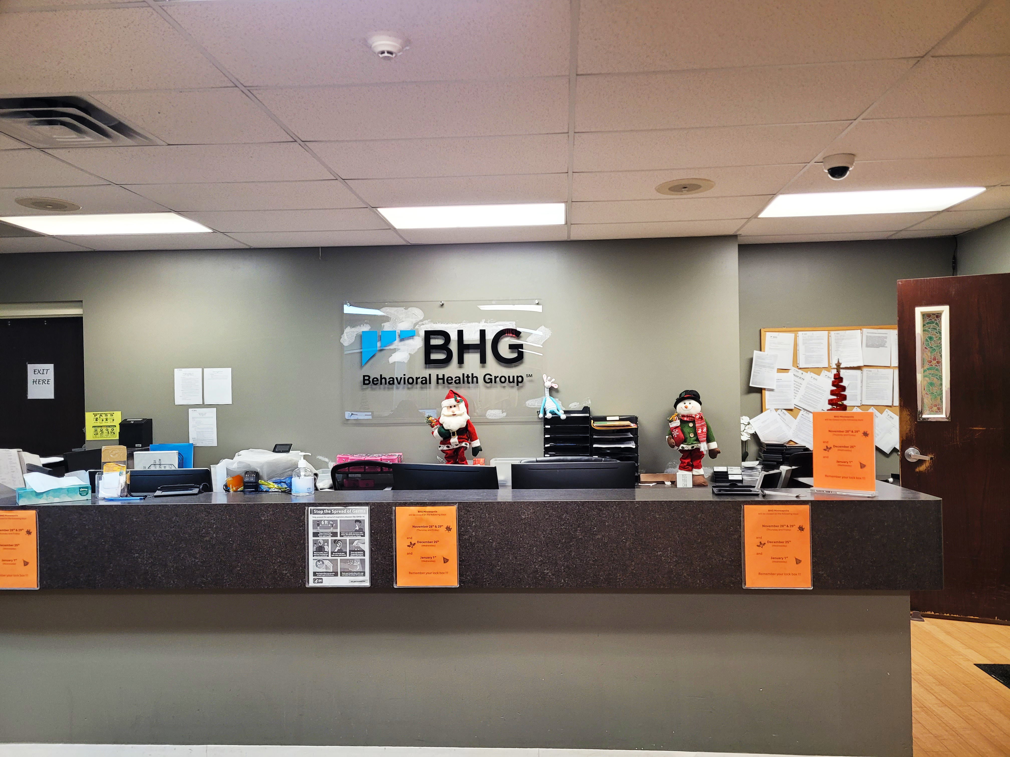 Reception desk with BHG logo in the lobby