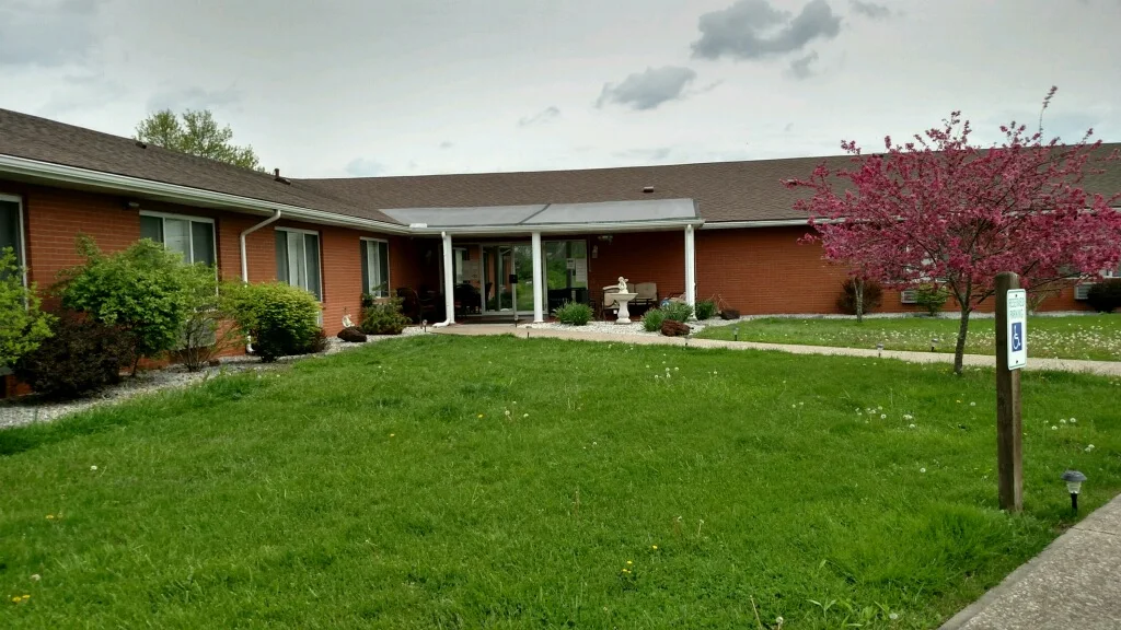 Exterior of Shepherds Shelter & Ross Rehab building with lawn
