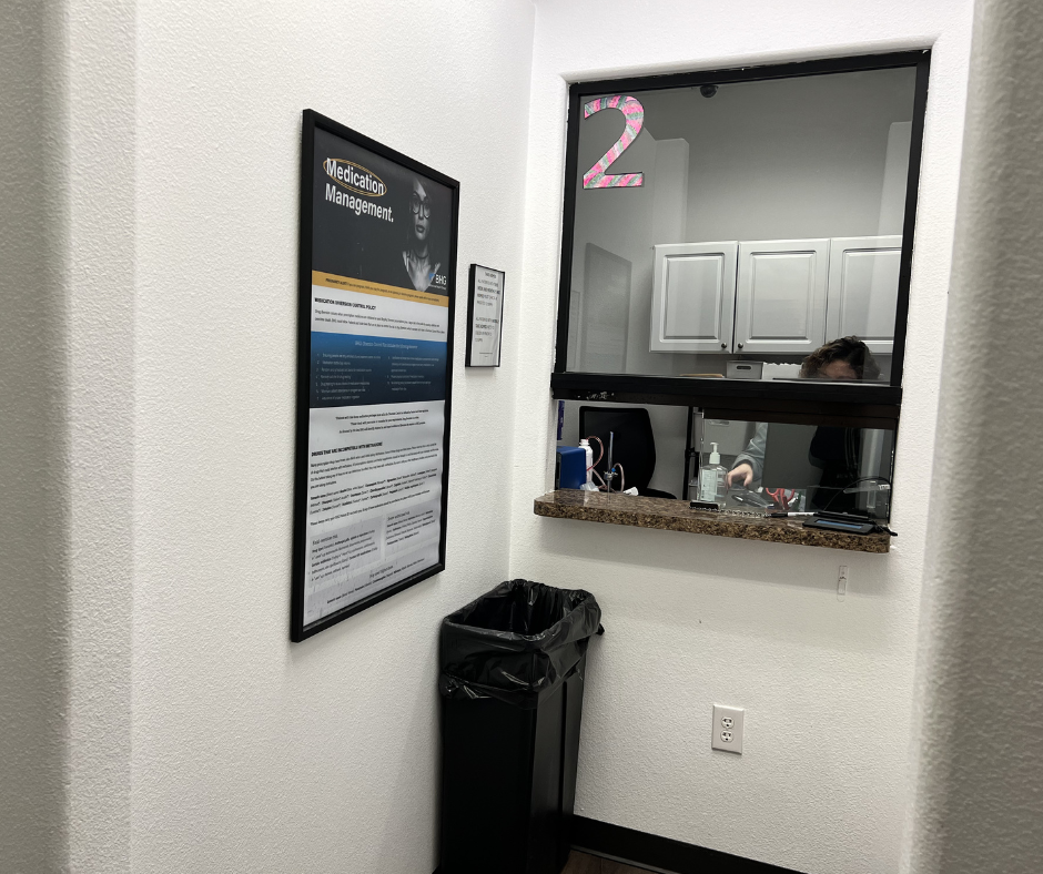 Medication service window with patient check-in counter
