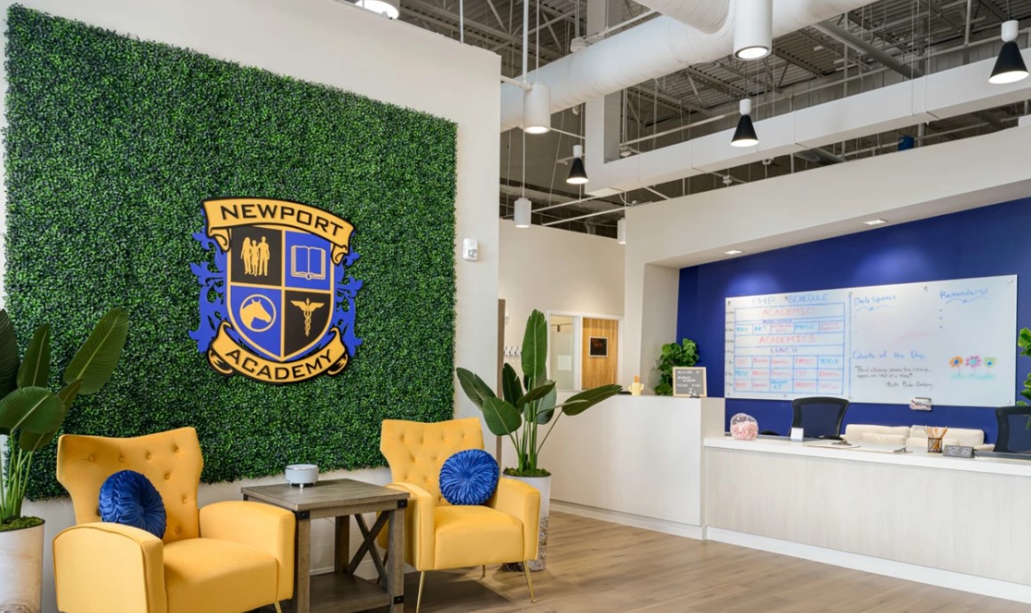 Reception area with signage and seating.