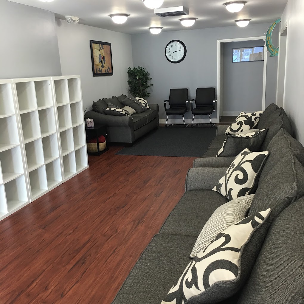 Lounge area with sofas and armchairs.