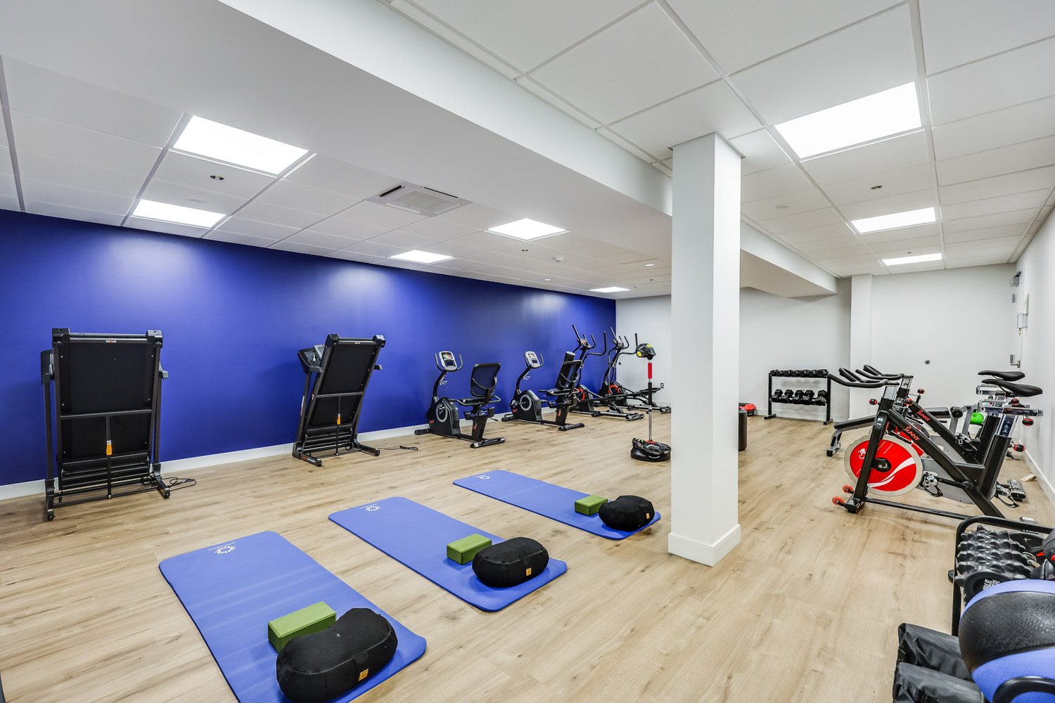 Exercise room with bikes and weights