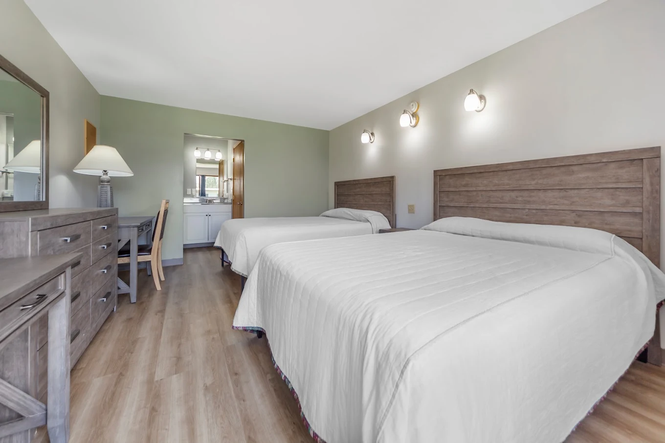 Shared bedroom with two beds and storage