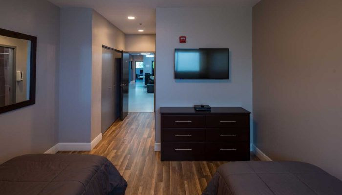 2 bedroom with TV set